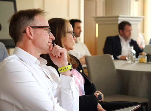 Clinicians at the Envisage Clinical Circle deep in discussion, reflecting on shared challenges and ideas to improve patient care and team wellbeing.